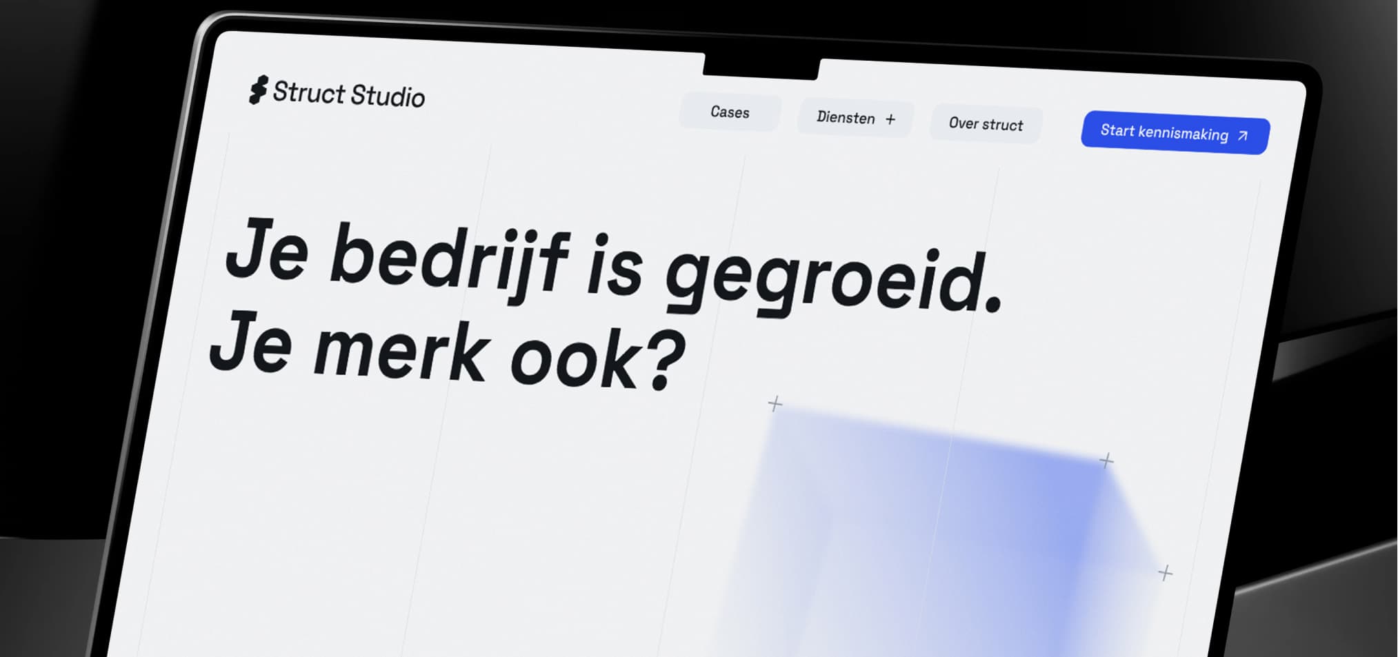 De homepage van Struct Studio getoond op een laptop
